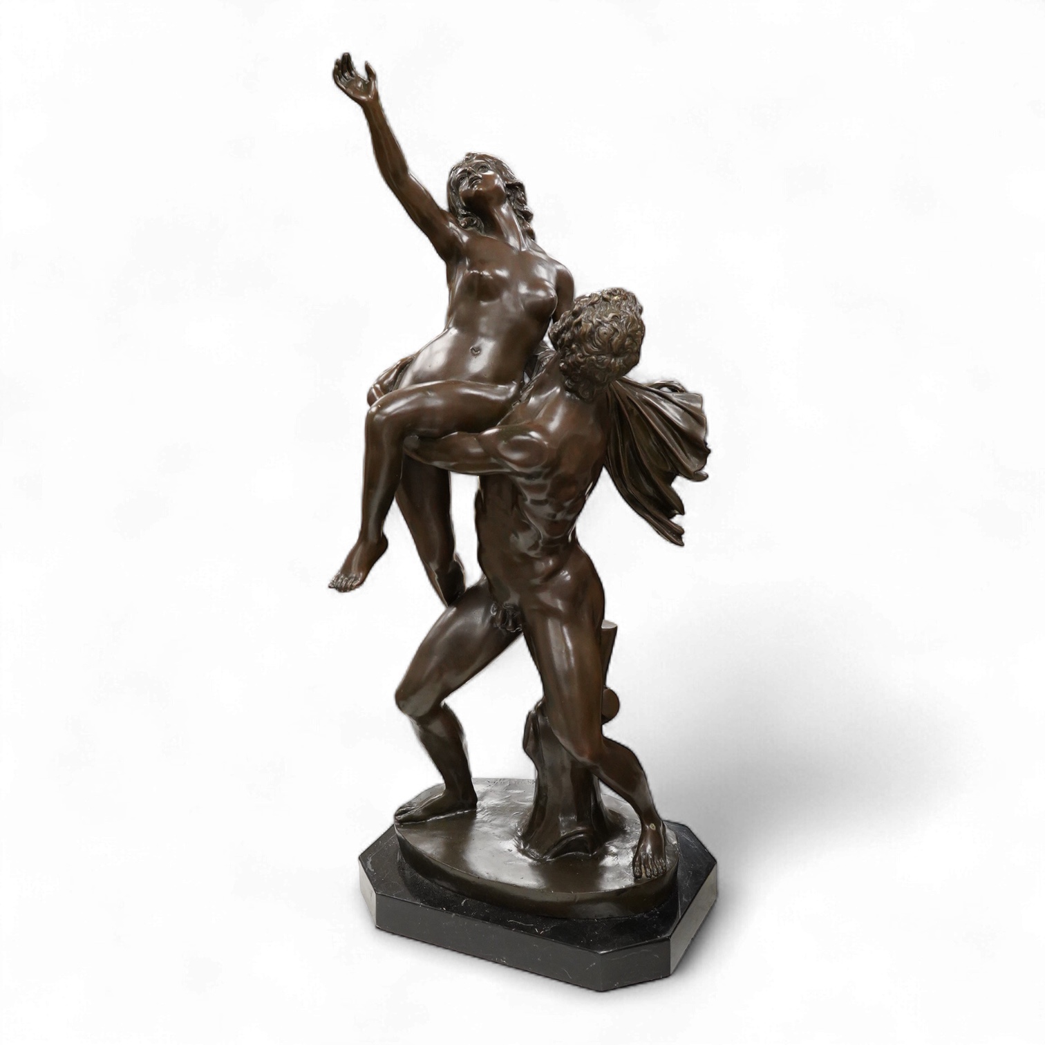 After Giambologna (1529-1608), ‘The Rape of a Sabine’, a patinated bronze raised on black marble base, 75.5cm high